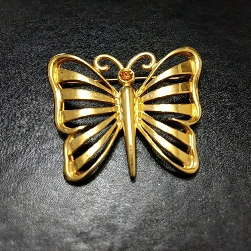 Vintage gold tone butterfly with rhinestone pin brooch